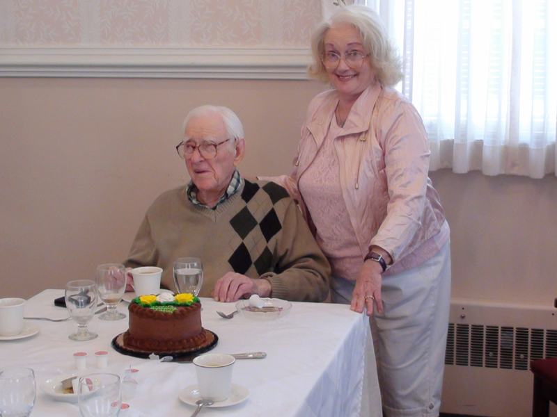 Emerson and Judy with 100th Birthday Cake