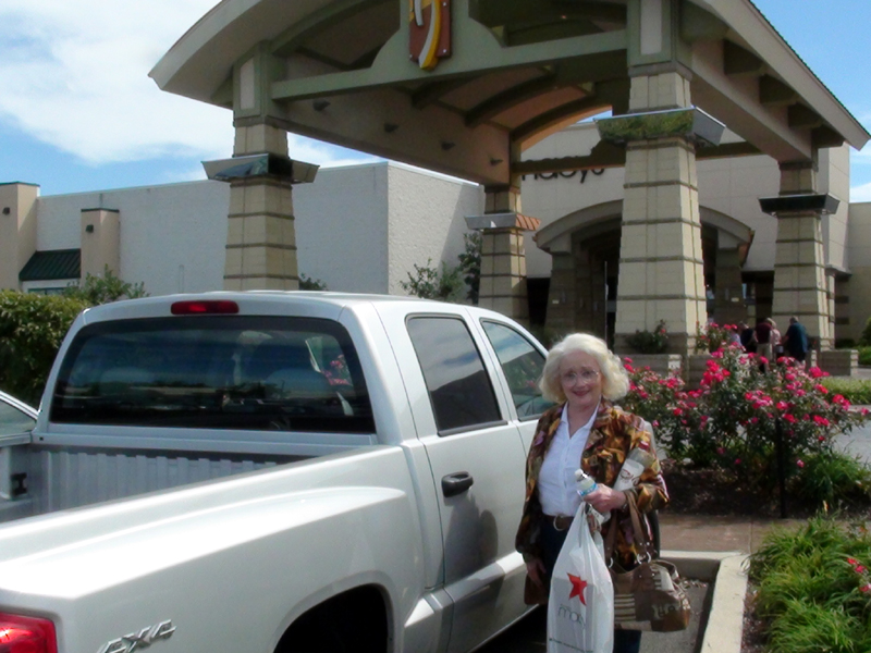 Judy next to her pickup